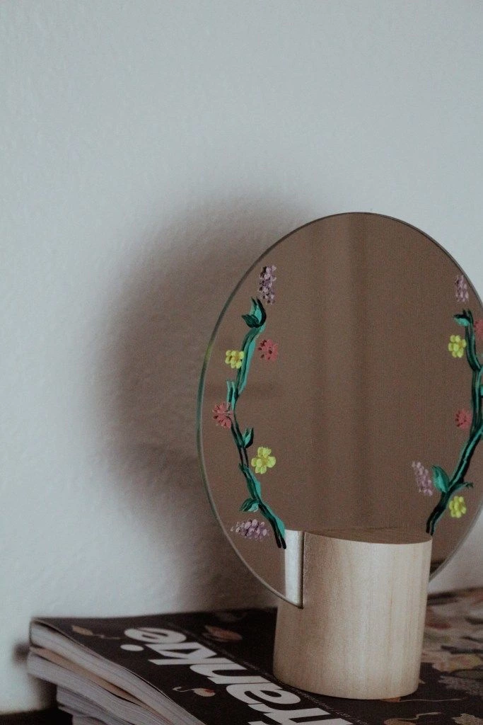 One of the easiest cottagecore DIYs on this list has to be this dainty painted mirror