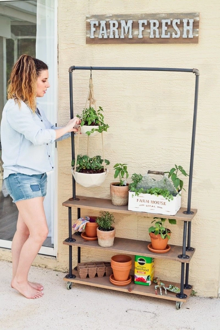 3 – Next, one of the best outdoor plant stand ideas – DIY Rolling Garden