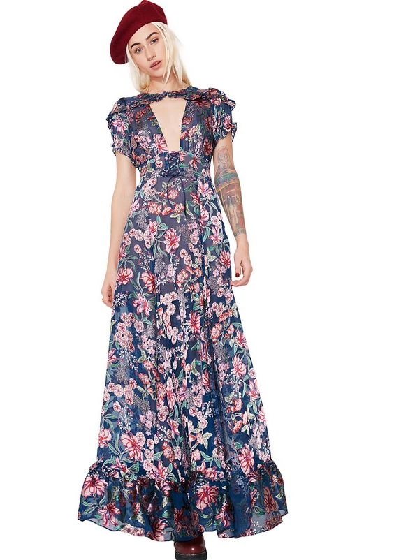 For Love & Lemons Flora Maxi Dress Will Have Ya Lookin’ Gorgeous Af! This Floral Maxi Dress Has A Cutout Deep V Neckline, Ruffle Trim Details, And A Back Zipper Closure.