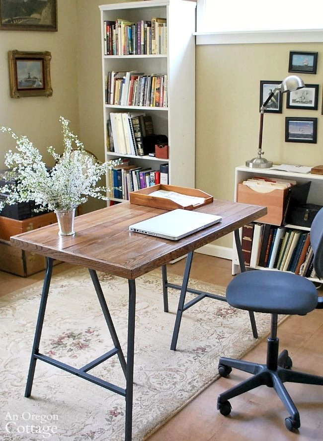 DIY Desk With Ikea Trestle Legs And Salvaged Wood Flooring Top- An Do-able Tutorial For An Industrial Style Table-desk For Under $30.