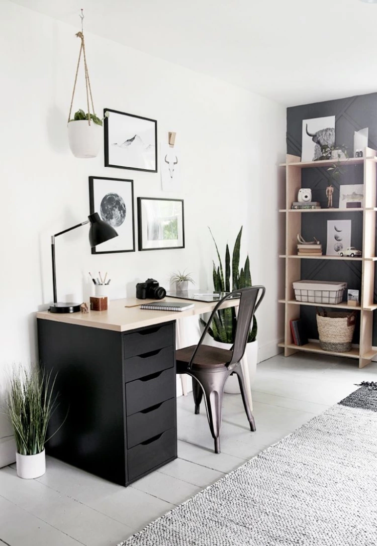 Room With Desk Artwork And Wood Shelves